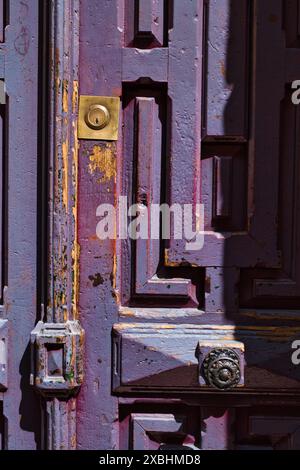 Close up of an old door of a building in Madrid Stock Photo
