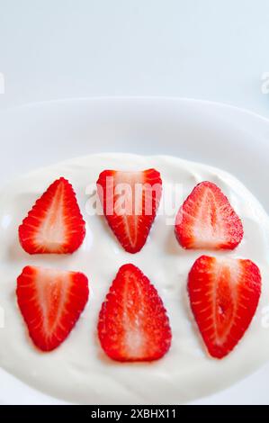 Strawberries with cream. Close view. Stock Photo