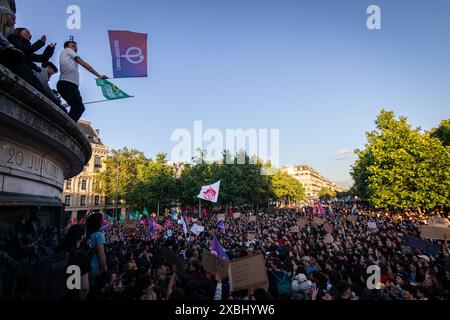 Protesters seen with placards expressing their opinion during the demonstration. Following the victory of Jordan Bardella of the Rassemblement National party in the European elections on 9 June and French President Emmanuel Macron's controversial decision to dissolve the National Assembly, thousands of people gathered for the third day in a row at Place République in a massive demonstration against the far right and in favors of the Front Populaire coalition, created by the left-wing parties La France Insoumise, the socialistes, communists and ecologists. (Photo by Telmo Pinto/SOPA Images/Si Stock Photo