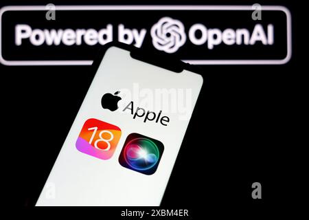 In this photo illustration a Apple iOS 18 logo seen displayed on an Apple iPhone with Open AI logo in the background. After the presentation of the ne Stock Photo