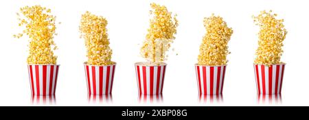 Set of paper striped bucket with popcorn isolated on white background, concept of watching TV or cinema. Stock Photo
