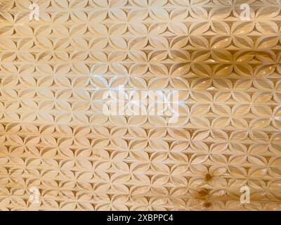 Close-Up of Decorative Wood Carving Pattern. Detailed Handcrafted Wooden Texture Background.. Stock Photo