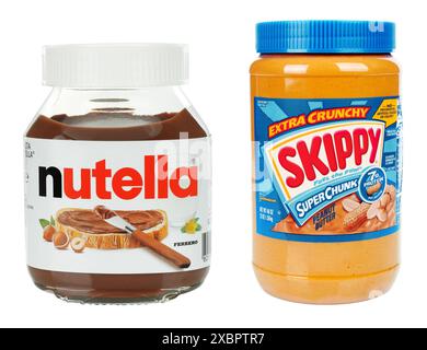 Set of Jars of Nutella chocolate butter and Skippy peanut butter Extra Crunchy Super Chunk, isolated on a white background Stock Photo