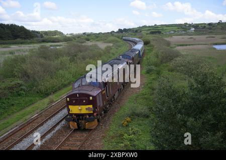 The Spring Cornish Explorer train from Dorridge to Penzance  and return on May 4th 2024 passing Marazion near Penzance Stock Photo