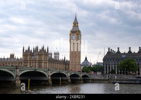 View towards the Houses of Parliament, the Palace of Westminster and clock tower aka Big Ben on 12th June 2024 in London, United Kingdom. Big Ben is the nickname for the Great Bell of the striking clock at the north end of the Palace of Westminster in London, England, although the name is frequently extended to refer also to the clock and the clock tower. Stock Photo