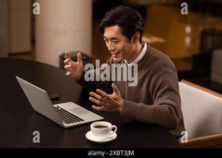 Male Teacher Remote Teaching Students Stock Photo