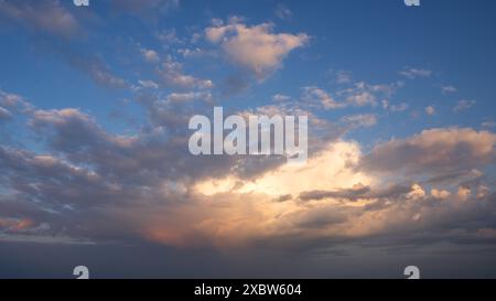 Low angle view to evening sky with dramatic clouds Stock Photo