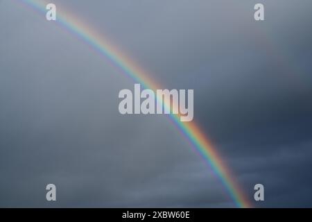Low angle view to sky with rainbow Stock Photo