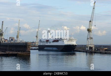 June 12,2024: The 40-year-old ferry GNV Azzurra hosts hundreds of police officers transferred from cruise ship Goddess of the Night, originally chartered to house more than 2,000 security members during G7 summit in Brindisi, Italy, but that is detained by Italian justice due to Carabinieri union allegations about hygiene & accommodation problems on board the 20-year-old vessel. Known as Costa Magica, the cruise ship was sold to Greek holding Seajets in 2023. Shortly renamed Mykonos Magic, the ship is planned to start new career in July with Neonyx Cruises. Credit: Kevin Izorce/Alamy Live News Stock Photo