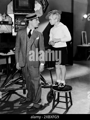 Buster Keaton, June 1931: American silent screen comedian and actor Buster Keaton (1895-1966) with fellow actor Jackie Cooper.*Filmstill - Editorial Use Only*.CAP/PLF.Supplied by Credit: Capital Pictures/Alamy Live News Stock Photo