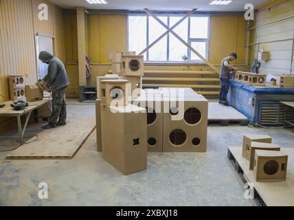 Bila Tserkva, Ukraine, March 18, 2021: Workers making speaker housings Stock Photo