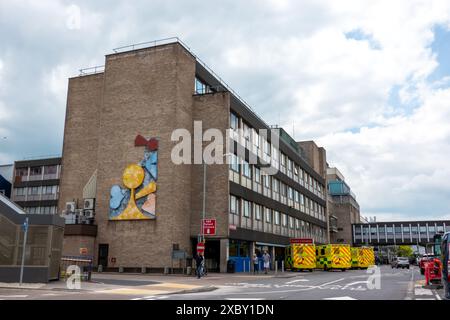 Addenbrookes hospital A&E accident and emergency with ambulances parked outside Stock Photo