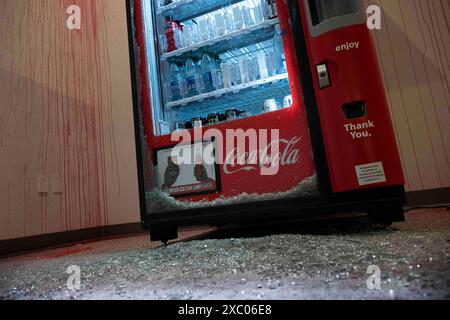 Los Angeles, United States. 12th June, 2024. A vending machine smashed with red paint streaking down the walls. A group of Pro-Palestinian protesters took over the Student Services building on the campus of California State University Los Angeles (Cal State LA) on Wednesday, June 12, leaving several thousands in damage. There was zero police activity the entirety of the takeover and ultimately the protesters just left the building as they got tired. Zero arrests were made. Credit: SOPA Images Limited/Ģ����ý Live News Stock Photo