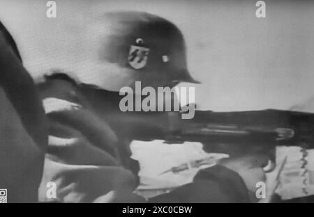 World War Two B&W Screenshot photo. Waffen SS Machine Gunner during the the Battle for Kharkov March 1943 Stock Photo