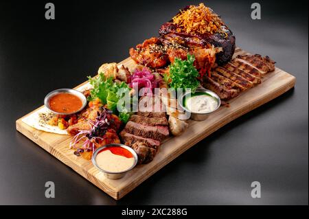 beer snacks on a wooden board. Stock Photo