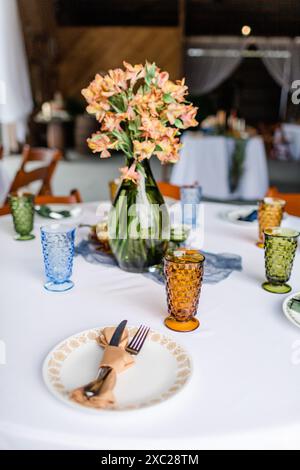 Autumn wedding table setting with cut glass goblets and plates Stock Photo