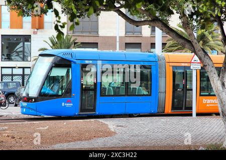 SANTA CRUZ, SPAIN - OCTOBER 27, 2012: People ride Tranvia tram in Santa Cruz, Spain. Tram line exists since 2007 and is the only existing tramway or t Stock Photo