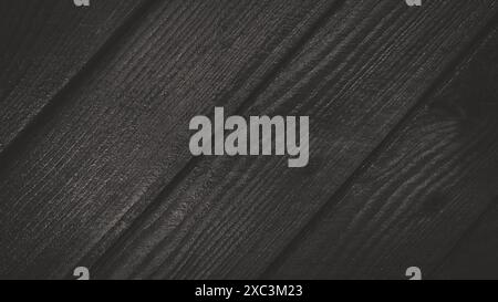 Dark textured wooden background. Top view of a wooden texture surface with dark vignetting effect for background. Stock Photo