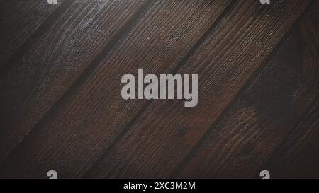 Dark textured wooden background. Top view of a wooden texture surface with dark vignetting effect for background. Stock Photo