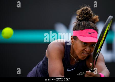 'S-HERTOGENBOSCH, NETHERLANDS - JUNE 14: Naomi Osaka of the United States of America plays a backhand in her women's singles quarter final match against Bianca Andreescu of Canada on Day 5 of the Libema Open Grass Court Championships at the Autotron on June 14, 2024 in 's-Hertogenbosch, Netherlands (Photo by Rene Nijhuis/BSR Agency) Credit: BSR Agency/Alamy Live News Stock Photo