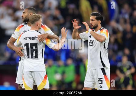 Munich Football Arena, Munich, Germany. 14th June, 2024. Euro 2024 Group A Football, Germany versus Scotland; 25 Emre Can (GER), celebrates his goal with team mate Maximilian Mittelstadt (GER) Credit: Action Plus Sports/Alamy Live News Stock Photo