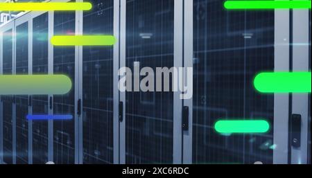 Image of colorful gradient light trails and light spot against computer server room Stock Photo