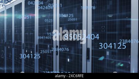 Image of multiple changing numbers and light spot over computer server room Stock Photo