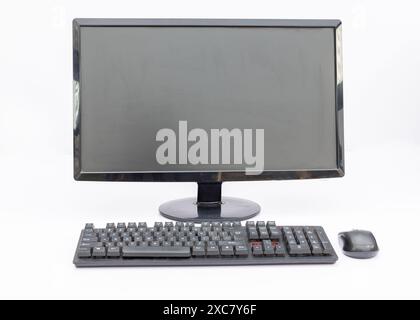 Computer Setup with Monitor, Keyboard, and Mouse isolated on White Background. Stock Photo