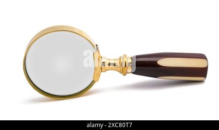 Vintage magnifying glass isolated on white background Stock Photo