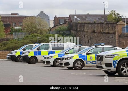 Police vehicles parked at District Headquarters, Bradford Stock Photo