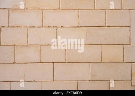 Background from a wall made of big blocks of bricks Stock Photo