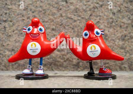 ZHONGSHAN China-June 15 2024: 2024 Paris Olympic Games and Paralympic Games mascots the Phryges at horizontal composition. Stock Photo