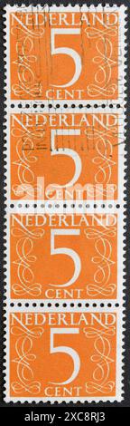 Cancelled postage stamp printed by Netherlands, shows the Numeral value, circa 1946. Stock Photo