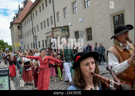 Lutherstadt Wittenberg, Germany. 15th June, 2024. The parade starts at Luther's house. The Wittenberg festival 'Luther's Wedding' takes place this weekend. On June 13, 1525, the former monk Martin Luther and the escaped nun Katharina von Bora married in Wittenberg. Credit: Heiko Rebsch/dpa/Alamy Live News Stock Photo