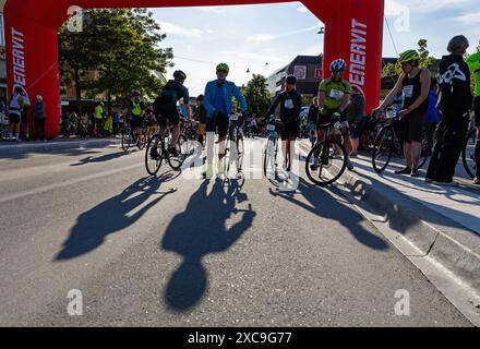 Cyclists in Motala, Sweden, during one of the world's largest recreational bicycle race, Vätternrundan, on Friday. Stock Photo