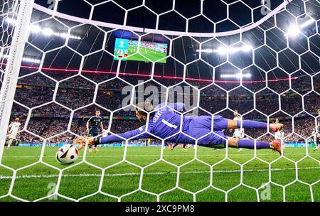 Emre Can, DFB 25 scores, shoots goal, Tor, Treffer, Torschuss, 5-1 against Angus Gunn, SCO 1 in the group stage match GERMANY - SCOTLAND 5-1 of the UEFA European Championships 2024 on Jun 14, 2024 in Munich, Germany. Photographer: ddp images/star-images Credit: ddp media GmbH/Alamy Live News Stock Photo