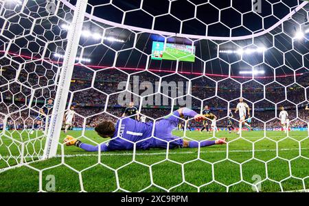 Emre Can, DFB 25 scores, shoots goal, Tor, Treffer, Torschuss, 5-1 against Angus Gunn, SCO 1 in the group stage match GERMANY - SCOTLAND 5-1 of the UEFA European Championships 2024 on Jun 14, 2024 in Munich, Germany. Photographer: ddp images/star-images Credit: ddp media GmbH/Alamy Live News Stock Photo