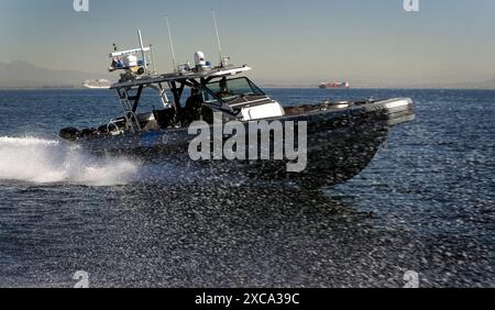 A U.S. Customs and Border Protection, Air and Marine Operations 41-foot Coastal Interceptor SAFE Boat patrols the Port of Long Beach, Calif., Feb. 7, 2022. CBP Photo by Glenn Fawcett Stock Photo