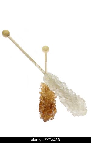 brown and white rock candy sticks isolated on white background Stock Photo