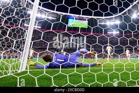 Emre Can, DFB 25   scores, shoots goal , Tor, Treffer, Torschuss, 5-1 against Angus Gunn, SCO 1  in the group stage match GERMANY  - SCOTLAND 5-1 of the UEFA European Championships 2024  on Jun 14, 2024  in Munich, Germany.  Photographer: Peter Schatz Stock Photo