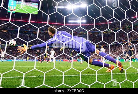 Emre Can, DFB 25   scores, shoots goal , Tor, Treffer, Torschuss, 5-1 against Angus Gunn, SCO 1  in the group stage match GERMANY  - SCOTLAND 5-1 of the UEFA European Championships 2024  on Jun 14, 2024  in Munich, Germany.  Photographer: Peter Schatz Stock Photo