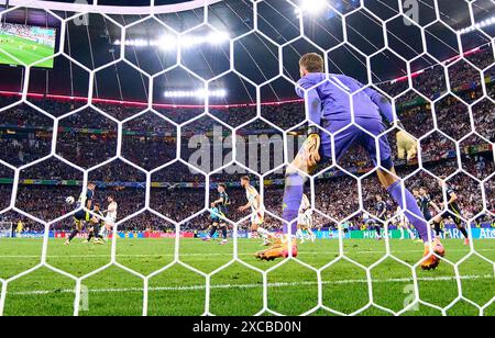 Emre Can, DFB 25   scores, shoots goal , Tor, Treffer, Torschuss, 5-1 against Angus Gunn, SCO 1  in the group stage match GERMANY  - SCOTLAND 5-1 of the UEFA European Championships 2024  on Jun 14, 2024  in Munich, Germany.  Photographer: Peter Schatz Stock Photo