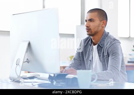 Confused, doubt or man on computer for problem solving, error solution or troubleshooting online. Startup, cybersecurity glitch or serious web Stock Photo