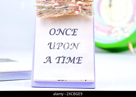 Once upon a time words the inscription on the calendar with tear-off leaves Stock Photo