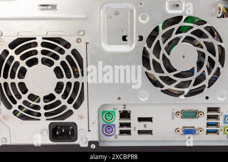 Rear View of a Desktop Computer Ports and Cooling Fans. Stock Photo