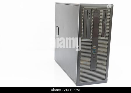 Side View of a Black Desktop Computer isolated on White Background Stock Photo