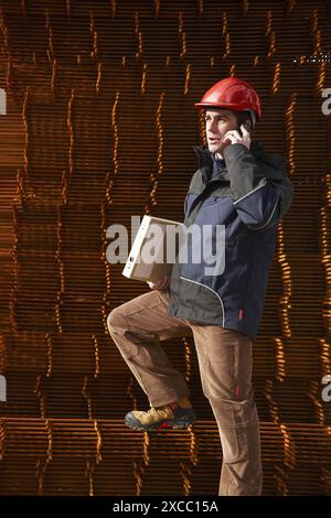 Architect, corrugated iron for formwork, housing construction Stock Photo