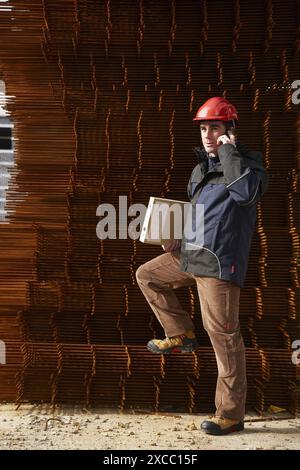 Architect, corrugated iron for formwork, housing construction Stock Photo
