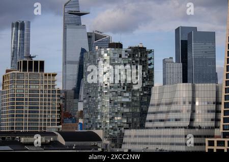 The urban skyline featuring numerous tall buildings and high-rises in New York City Stock Photo