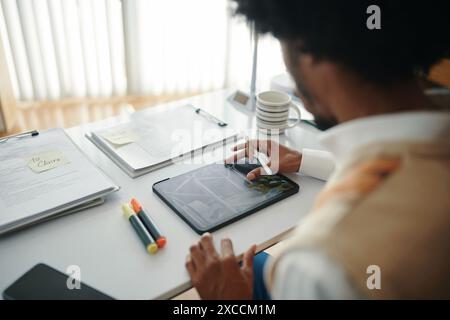Cropped image of sustainable engineer working on big project Stock Photo